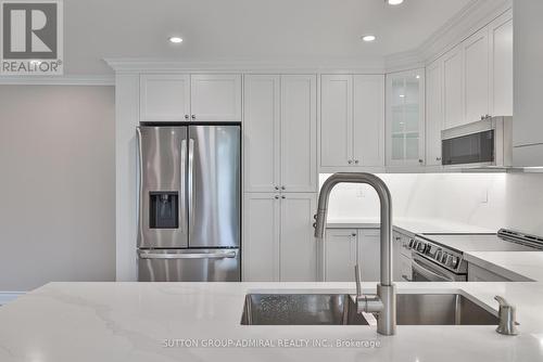 104 - 90 Fisherville Road, Toronto (Westminster-Branson), ON - Indoor Photo Showing Kitchen With Double Sink With Upgraded Kitchen