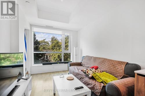 301 - 150 Logan Avenue, Toronto (South Riverdale), ON - Indoor Photo Showing Living Room