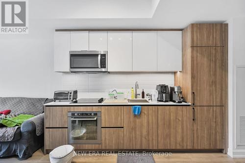 301 - 150 Logan Avenue, Toronto (South Riverdale), ON - Indoor Photo Showing Kitchen