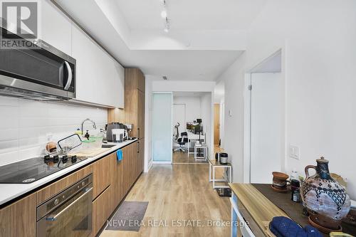 301 - 150 Logan Avenue, Toronto (South Riverdale), ON - Indoor Photo Showing Kitchen With Upgraded Kitchen