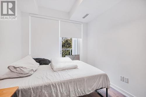 301 - 150 Logan Avenue, Toronto (South Riverdale), ON - Indoor Photo Showing Bedroom