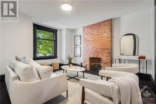 38 Foster Street, Ottawa, ON - Indoor Photo Showing Living Room With Fireplace