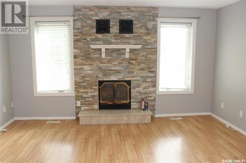 6731 Mawson Avenue, Regina, SK - Indoor Photo Showing Living Room With Fireplace