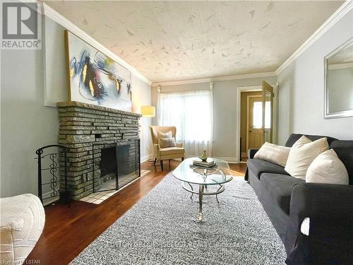 1324 Langmuir Avenue, London, ON - Indoor Photo Showing Living Room With Fireplace