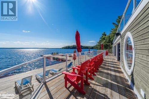 Boathouse dock - 1869 Muskoka Road 118 Highway W Unit# E201-D2, Muskoka Lakes, ON - Outdoor With Body Of Water