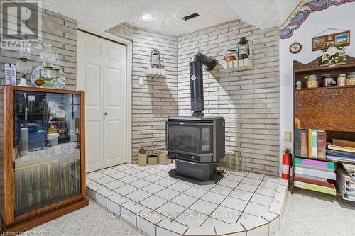 318106 Highway 6 & 10, Georgian Bluffs, ON - Indoor Photo Showing Other Room With Fireplace