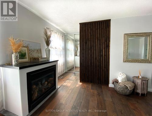 36 Crompton Drive, Barrie (Little Lake), ON - Indoor Photo Showing Living Room With Fireplace