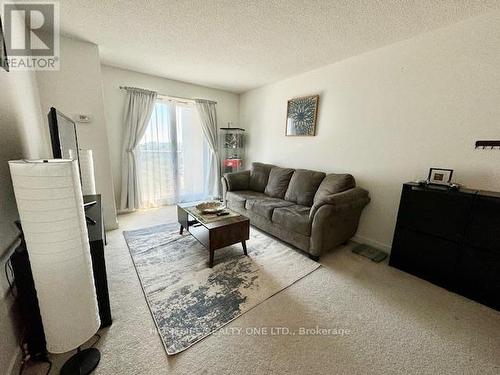 901 - 1346 Danforth Road, Toronto (Eglinton East), ON - Indoor Photo Showing Living Room