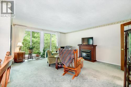 308 - 1111 Water Street, Peterborough (Northcrest), ON - Indoor With Fireplace