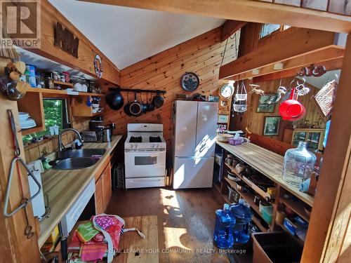 91 Healey Lake Water/A, The Archipelago, ON - Indoor Photo Showing Kitchen With Double Sink