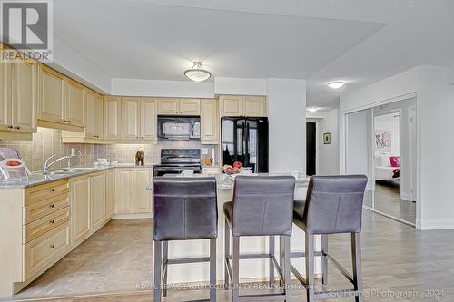 704 - 55 De Boers Drive, Toronto (York University Heights), ON - Indoor Photo Showing Kitchen With Double Sink