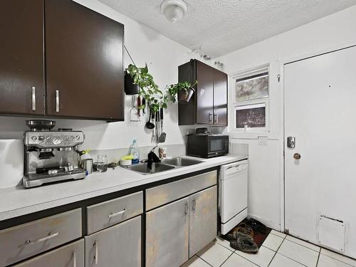 2090/2092 Westsyde Road, Kamloops, BC - Indoor Photo Showing Kitchen With Double Sink