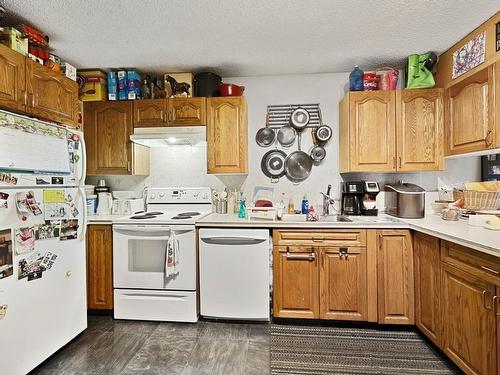 2090/2092 Westsyde Road, Kamloops, BC - Indoor Photo Showing Kitchen With Double Sink