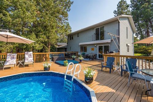 1996 Tomat Avenue, Kelowna, BC - Outdoor With Above Ground Pool With Deck Patio Veranda With Exterior