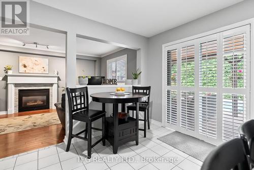 4 Mcivor Street, Whitby (Rolling Acres), ON - Indoor Photo Showing Dining Room With Fireplace