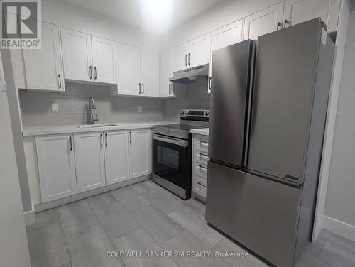 102 - 350 Malaga Road, Oshawa (Stevenson), ON - Indoor Photo Showing Kitchen With Stainless Steel Kitchen