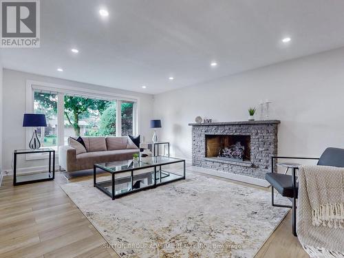 23 Quincy Crescent, Toronto (Henry Farm), ON - Indoor Photo Showing Living Room With Fireplace