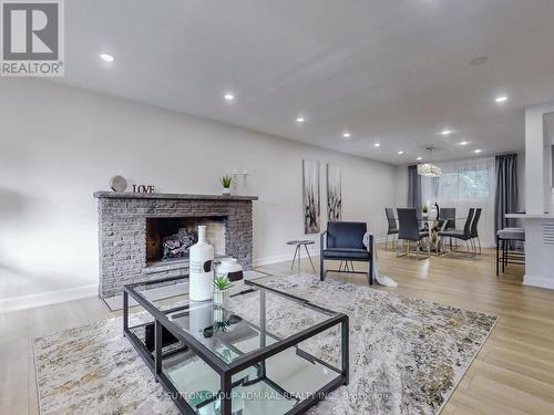 23 Quincy Crescent, Toronto (Henry Farm), ON - Indoor Photo Showing Living Room With Fireplace