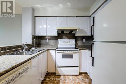 506 - 942 Yonge Street, Toronto (Annex), ON - Indoor Photo Showing Kitchen With Double Sink