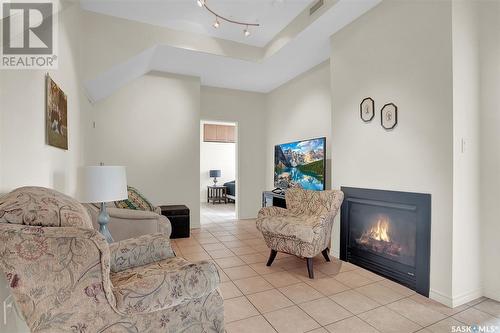 510 1275 Broad Street, Regina, SK - Indoor Photo Showing Living Room With Fireplace