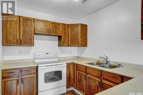 7302 Whelan Drive, Regina, SK - Indoor Photo Showing Kitchen With Double Sink