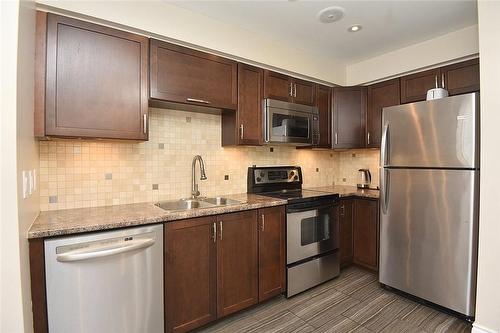 895 Maple Avenue|Unit #634, Burlington, ON - Indoor Photo Showing Kitchen With Double Sink