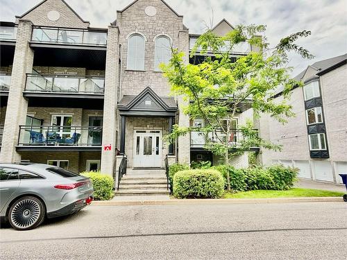 Frontage - 201-2160 Rue Bonaventure, Laval (Sainte-Dorothée), QC - Outdoor With Balcony With Facade