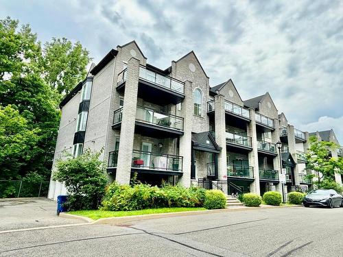 Frontage - 201-2160 Rue Bonaventure, Laval (Sainte-Dorothée), QC - Outdoor With Balcony With Facade