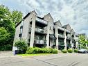 Frontage - 201-2160 Rue Bonaventure, Laval (Sainte-Dorothée), QC  - Outdoor With Balcony With Facade 