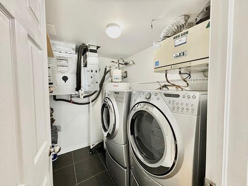 Laundry room - 202-2160 Rue Bonaventure, Laval (Sainte-Dorothée), QC - Indoor Photo Showing Laundry Room