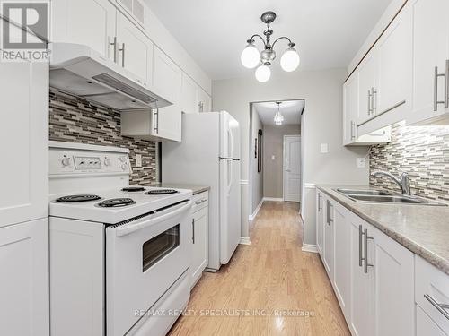 1403 - 61 Richview Road, Toronto (Humber Heights), ON - Indoor Photo Showing Kitchen With Double Sink