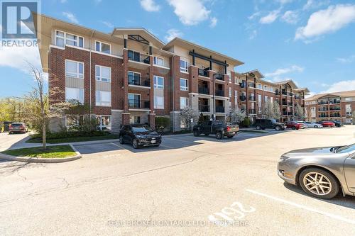 314 - 43 Goodwin Drive, Guelph (Pine Ridge), ON - Outdoor With Facade