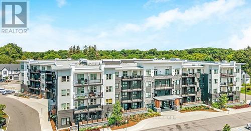 228 - 110 Fergus Avenue, Kitchener, ON - Outdoor With Facade