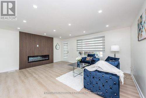 310 Pharmacy Avenue, Toronto (Clairlea-Birchmount), ON - Indoor Photo Showing Living Room With Fireplace