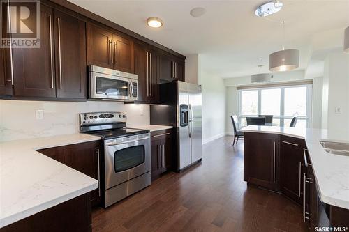 508 902 Spadina Crescent E, Saskatoon, SK - Indoor Photo Showing Kitchen With Double Sink