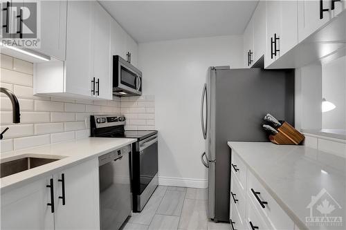 270 Brittany Drive Unit#307, Ottawa, ON - Indoor Photo Showing Kitchen With Upgraded Kitchen