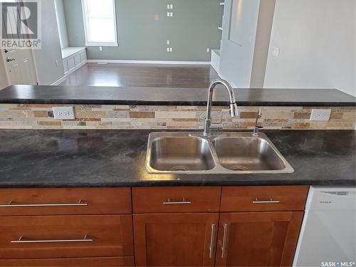 113 6Th Street E, Ponteix, SK - Indoor Photo Showing Kitchen With Double Sink