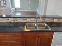 113 6Th Street E, Ponteix, SK  - Indoor Photo Showing Kitchen With Double Sink 