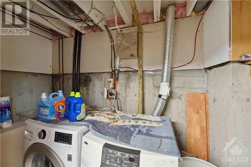 laundry in large storage closet off rec. room. - 1410 Palmerston Drive, Ottawa, ON - Indoor Photo Showing Laundry Room