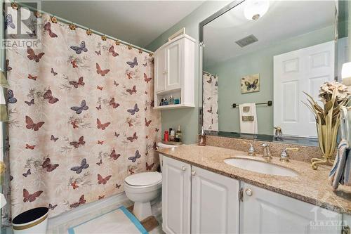 Updated vanity with granite top also Ceramic floors - 1410 Palmerston Drive, Ottawa, ON - Indoor Photo Showing Bathroom