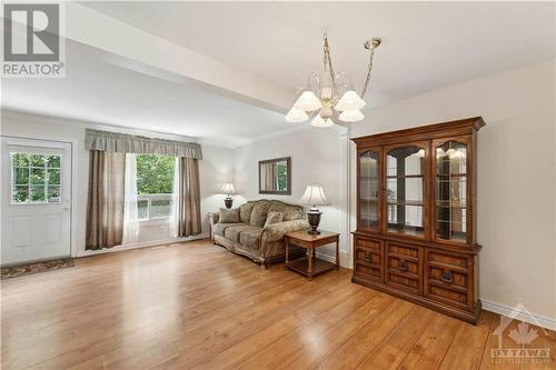 wide plank laminate floor in living and dining - 1410 Palmerston Drive, Ottawa, ON - Indoor