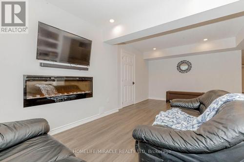 32 Mcintyre Lane, East Luther Grand Valley (Grand Valley), ON - Indoor Photo Showing Living Room With Fireplace