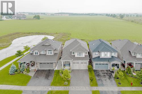 32 Mcintyre Lane, East Luther Grand Valley (Grand Valley), ON - Outdoor With Facade With View