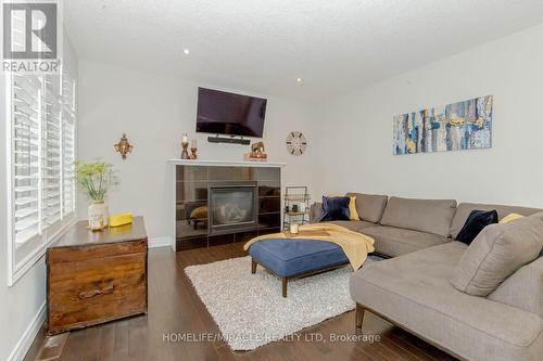 32 Mcintyre Lane, East Luther Grand Valley (Grand Valley), ON - Indoor Photo Showing Living Room With Fireplace