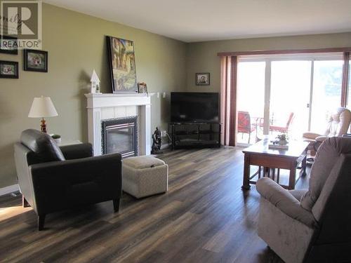 66 500 Wotzke Drive, Williams Lake, BC - Indoor Photo Showing Living Room With Fireplace