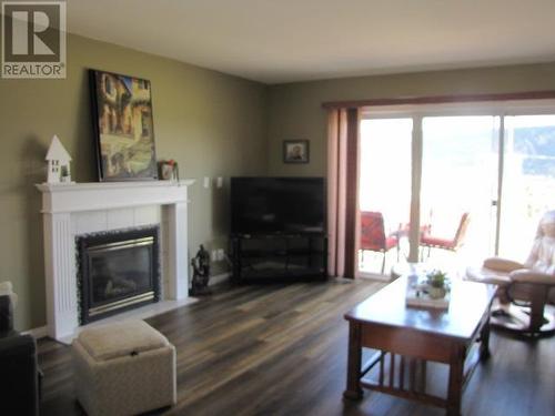 66 500 Wotzke Drive, Williams Lake, BC - Indoor Photo Showing Living Room With Fireplace