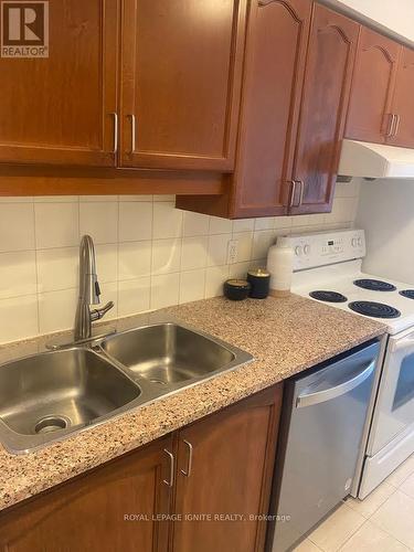 306 - 60 Town Centre Court, Toronto (Bendale), ON - Indoor Photo Showing Kitchen With Double Sink