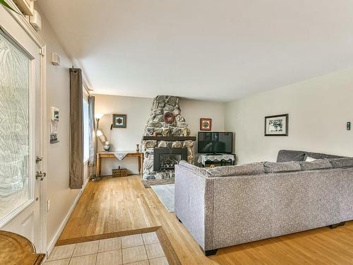 Living room - 50 Av. Carmen, Saint-Sauveur, QC - Indoor Photo Showing Living Room With Fireplace