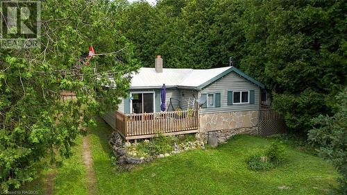 Spend the rest of your summer in this iconic Stokes Bay cottage featuring 3 bedrooms, 1 bath and a double deep lot! - 615 Stokes Bay Rd, North Bruce Peninsula, ON - Outdoor