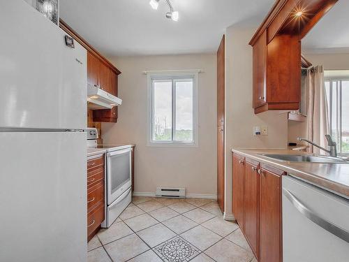 Kitchen - 202-361 Ch. De La Côte-St-Louis, Sainte-Thérèse, QC - Indoor Photo Showing Laundry Room